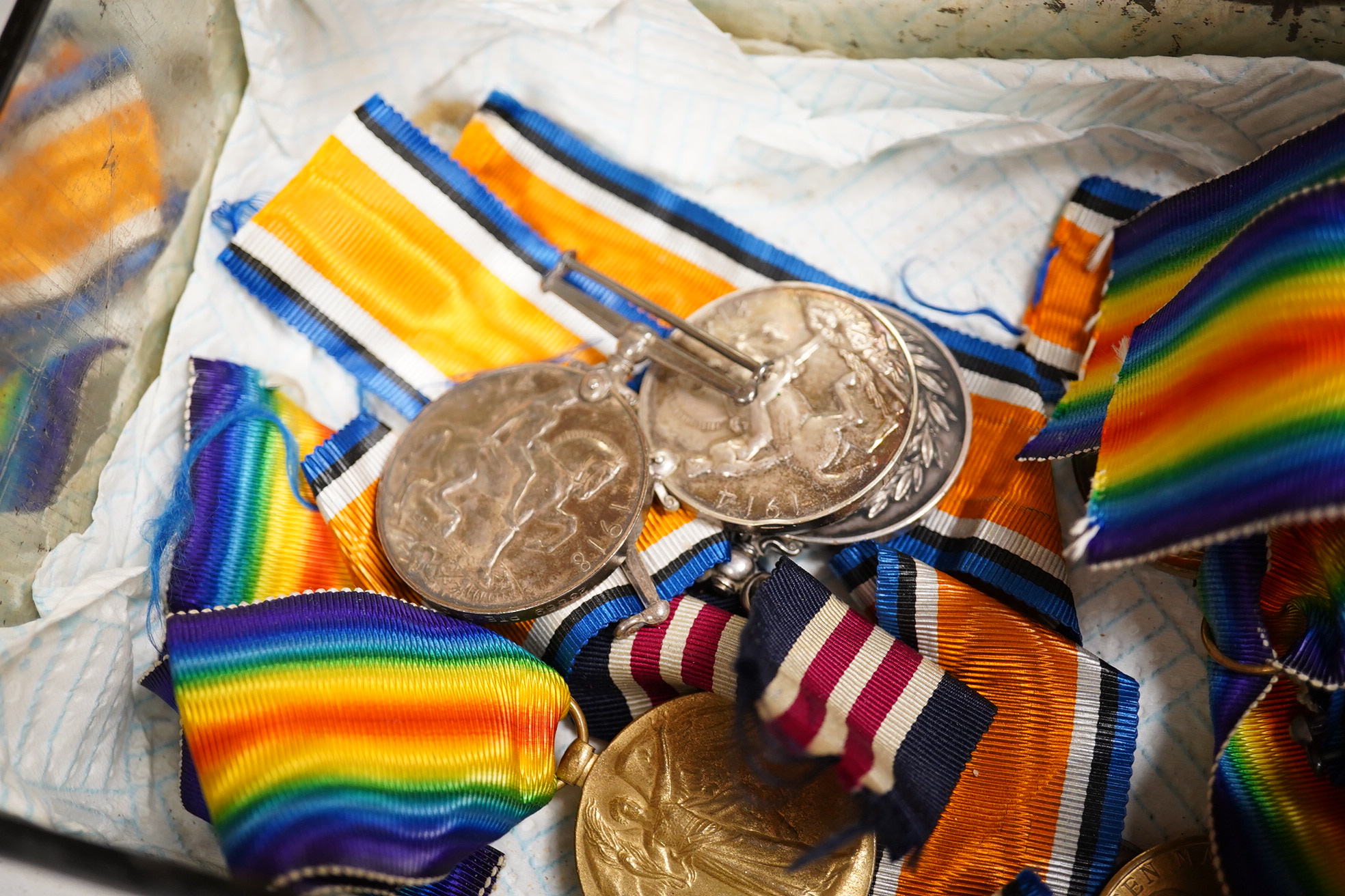 Three medal groups, including; a First World War Military Medal group awarded to SJT. W. Ashenden I/E. SURR. R. with WWI pair, together with two other WWI pairs awarded to DVR. E.R. Gullum. H.A.C. ART., and PTE. B.C. Gre